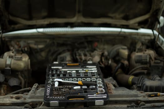 Tool box in car. Nuts unscrewing keys. Engine repair. Machine Breaker.