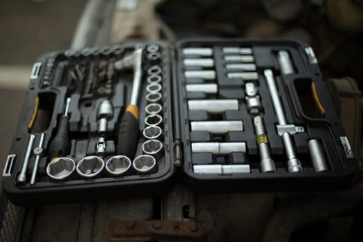 Tool box. Repair keys. Heads for unscrewing nuts. Repair kit. Chrome-plated steel. Drawer with bolts.