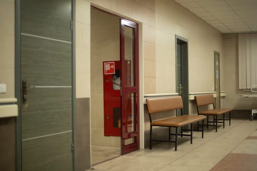 Indoor bench. The interior of the hospital. Empty corridor. Hospital Room Details. Waiting area.