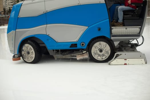 Ice cleaning in the stadium. Ice preparation. Ice Rink Pouring Machine. Fleet Maintenance.