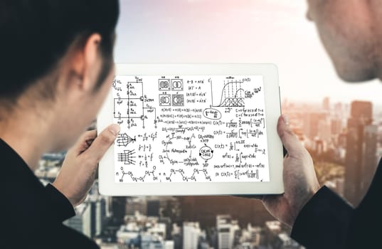 Mathematic equations and modish formula on computer screen showing concept of science and education