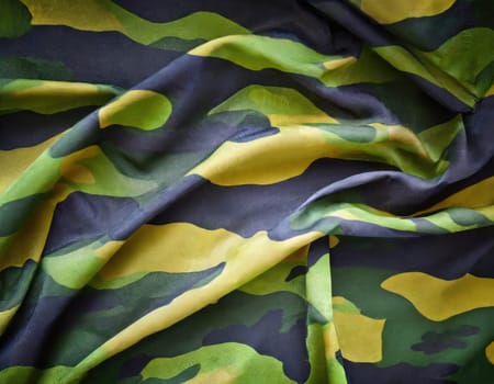 Camouflage texture in a military style on silk fabric. Hight realistics silk.