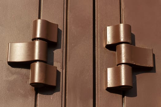 Hinges on door. Brown door hinges. Solid fittings. Login details.