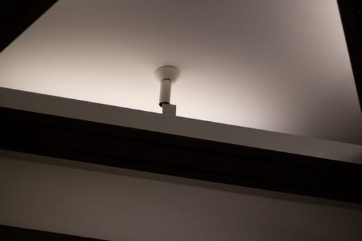 Light design. Lighting equipment on ceiling. Architecture details. Fluorescent lamps.