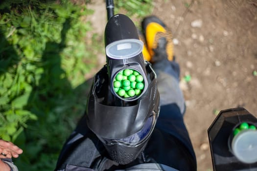 Balls with paint in jar. Sports equipment. Preparation for tactical shooting at target.