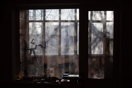 Window in morning. Interior details. View of window in dark. Morning light.