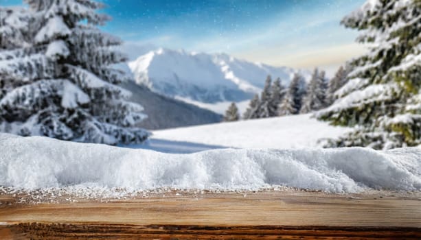 Wooden desk cover of snow and frost with christmas tree branch decoration.