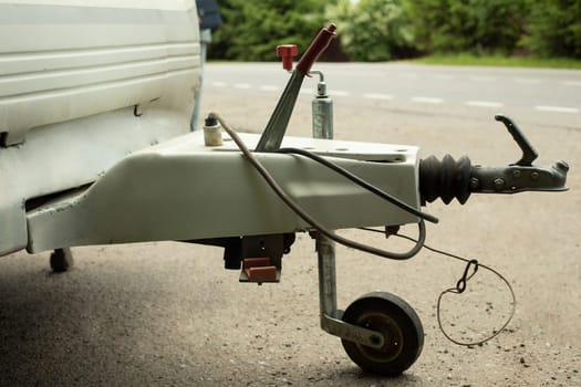 Trailer car at home. Mechanism of adhesion of transport. Car parts. Lever for attaching trailer.