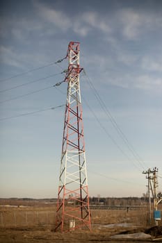 Cell tower. Antenna in field. Reception. Radio broadcasting facility.