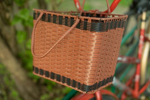 Basket for products on bike. Basket on steering wheel. Family Bike Details. Wicker box.