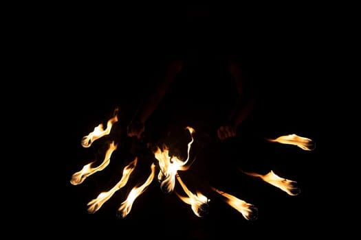 Lights in dark. Burning flames at night. Texture of burning fuel. Details of fire show.