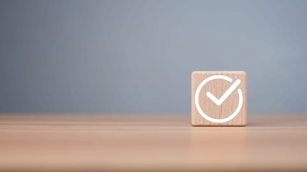 Checklist concept, Check mark on wooden blocks wooden background with copy space, project feasibility concept. Tick and cross signs. Checkmark and cross icons. approve and disapprove symbols.