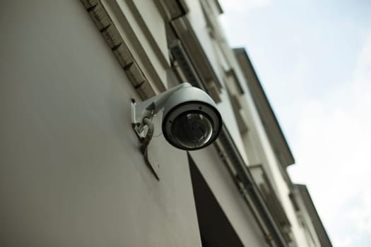 Surveillance camera. Spherical video camera on house. Street recorder. Safety system.