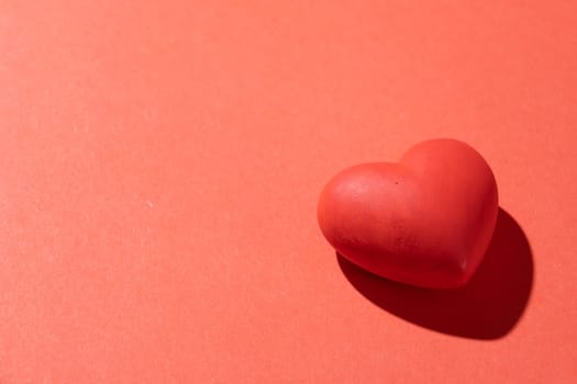 Valentines day. Red heart with copy space isolated on red background