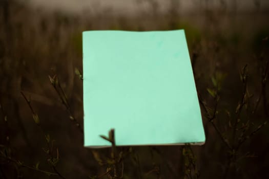 School notebook in Russia. Old notebook on street. Paper is green. Space for inscription.