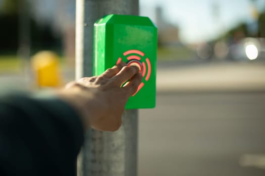 Pedestrian crossing alarm button. Button for road. Clicking on panel. Automatic pedestrian crossing.