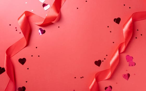 Valentines day. valentine red ribbons, confetti and gifts on red background