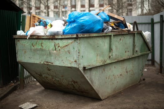 Garbage can. Waste container. City dump. Garbage collection in city.