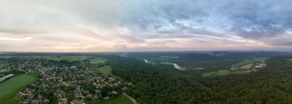 Sunset over the monastery of Schaeftlarn with Isar River View.