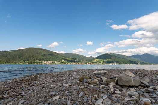 Pebbled Shoreline of Tegernsee with Alpine View, Bavaria.