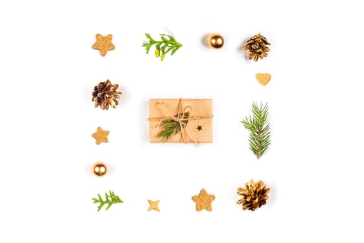 Christmas and New Year's gift surrounded by natural decor on a white isolated background.