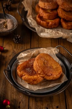 Traditional Portuguese Christmas Rabanadas. Spanish Torrijas on kitchen countertop.