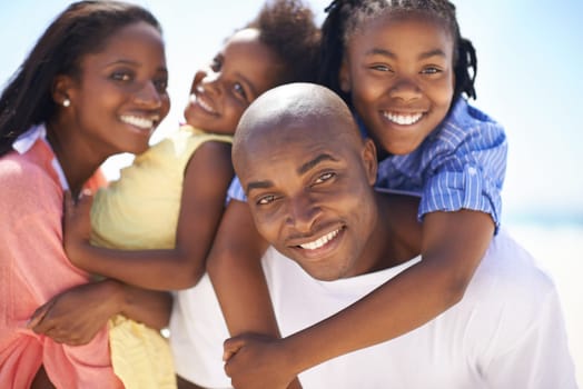 Black family, parents or children and portrait outdoor for adventure, holiday or vacation in summer. African people, face or smile on beach or nature for break, experience or bonding and relationship.