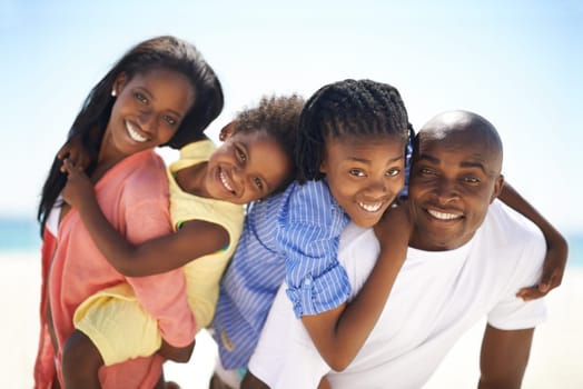 Black family, parents and kids with piggyback on beach for adventure, holiday or vacation in summer. African people, face or smile outdoor in nature for break, experience or bonding with relationship.