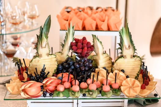 Fruit serving plate, vitamins in the form of fresh fruit, various fruits.