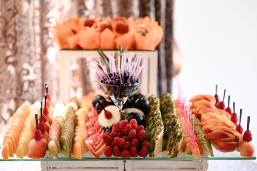 Fruit serving plate, vitamins in the form of fresh fruit, various fruits.