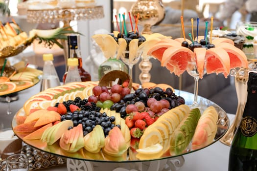 Fruit serving plate, vitamins in the form of fresh fruit, various fruits.