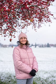 Winter Elegance: Portrait of a Beautiful Girl in a Snowy European Village