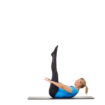 Woman, yoga and mat in studio for stretching, fitness or workout for healthy body, wellness or core muscle. Person, exercise or pilates on floor for abdomen health on mockup space or white background.