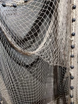 woven fishing net close-up in sunlight