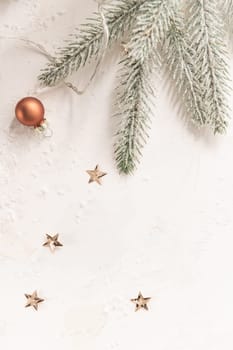 Christmas decorations on white grunge wooden board background.