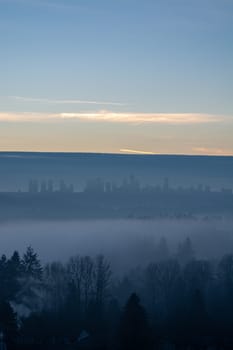 Clear sky background above Metrotown covered with thick fog
