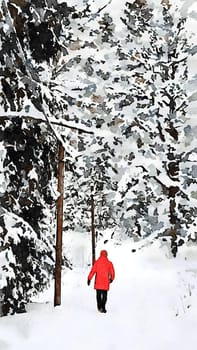 A person dressed in red walks alone in the snowy forest during a sunny day in winter.