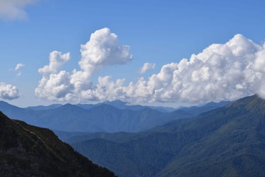 A view of a valley with mountains in the background, featured on flickr, new objectivity, creative commons attribution, panorama