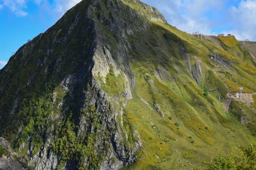 A mountain side with grass and trees on it, featured on unsplash, naturalism, wimmelbilder, panorama