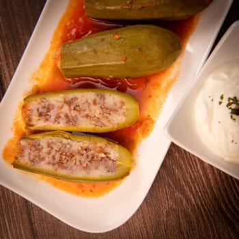 RECIPE FOR LEBANESE-STYLE MINI ZUCCHINI STUFFED WITH RICE AND BEEF IN A TOMATO SAUCE, High quality photo