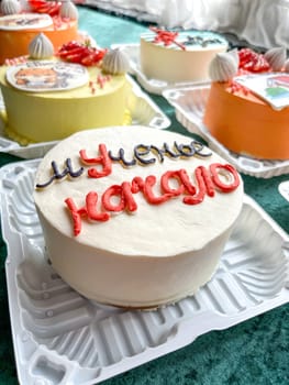 assorted festive bento cakes on the table.