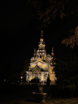 Orthodox Cathedral in the park in Almaty at night.