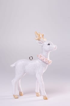 christmas tree toy white fawn on a white background.