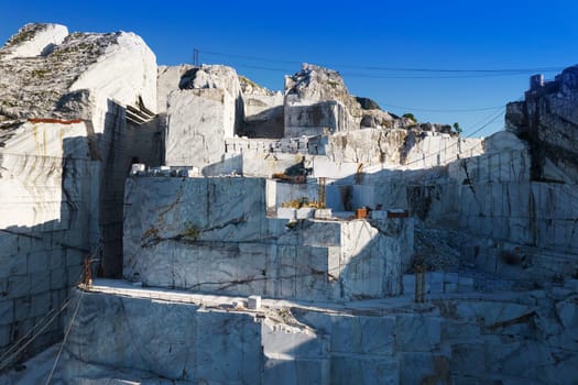 Aerial photographic documentation of a quarry for the extraction of white marble in Carrara Italy 
