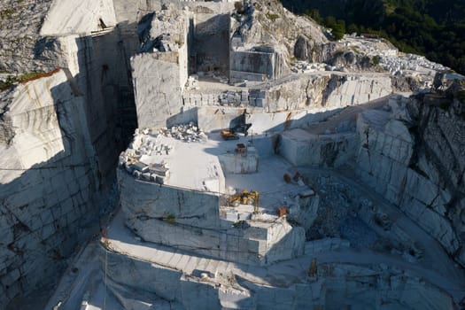 Aerial photographic documentation of a quarry for the extraction of white marble in Carrara Italy 
