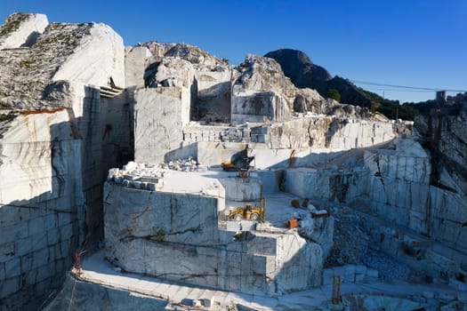 Aerial photographic documentation of a quarry for the extraction of white marble in Carrara Italy 
