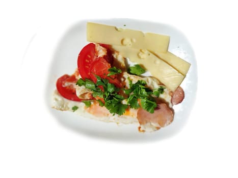 Scrambled eggs with bacon, herbs, tomatoes and cheese on a white background, view from above