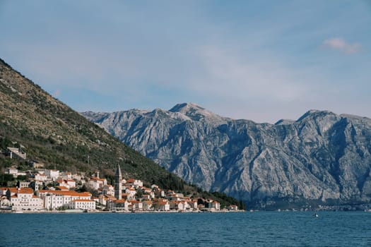 Ancient town of Perast at the foot of the mountains on the seashore. Montenegro. High quality photo