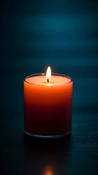 Candle flame dances within the confines of a glass, casting a warm light upon the stillness of the night, as wax slowly melts - generative AI