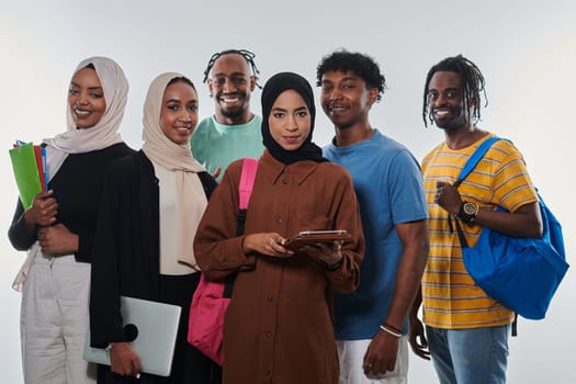 Group of diverse students engages in modern educational practices, utilizing a variety of technological tools such as laptops, tablets, and smartphones against a clean white background, exemplifying the contemporary approach to collaborative learning and information access.